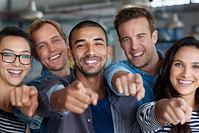 Buy stock photo Diverse group of positive colleagues pointing their fingers at the camera