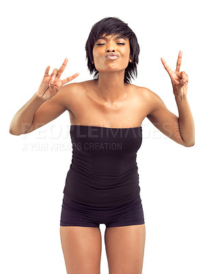 Buy stock photo Beautiful smiling african woman in a white studio, making peace signs and a kissy-face