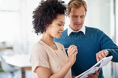 Buy stock photo Woman, man and reading with notepad in workplace with idea, brainstorming or discussion for creativity. Business people, partnership and notes with mentorship, problem solving and solution at startup