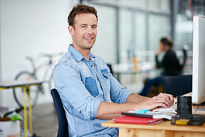 Buy stock photo Portrait, smile and business man typing on computer in office at startup, company or workplace for career. Happy face, creative writer and entrepreneur on desktop for work email or project in Italy