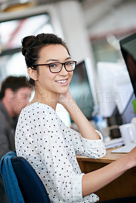 Buy stock photo Portrait, creative and happy business woman in office at startup company on computer for coworking. Face, professional entrepreneur and smile of employee, worker or web developer in glasses at job