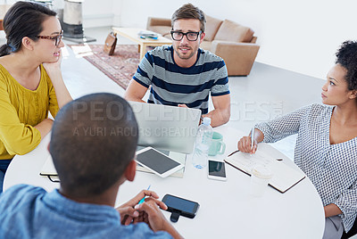 Buy stock photo Shot of a group of designers at work in an office