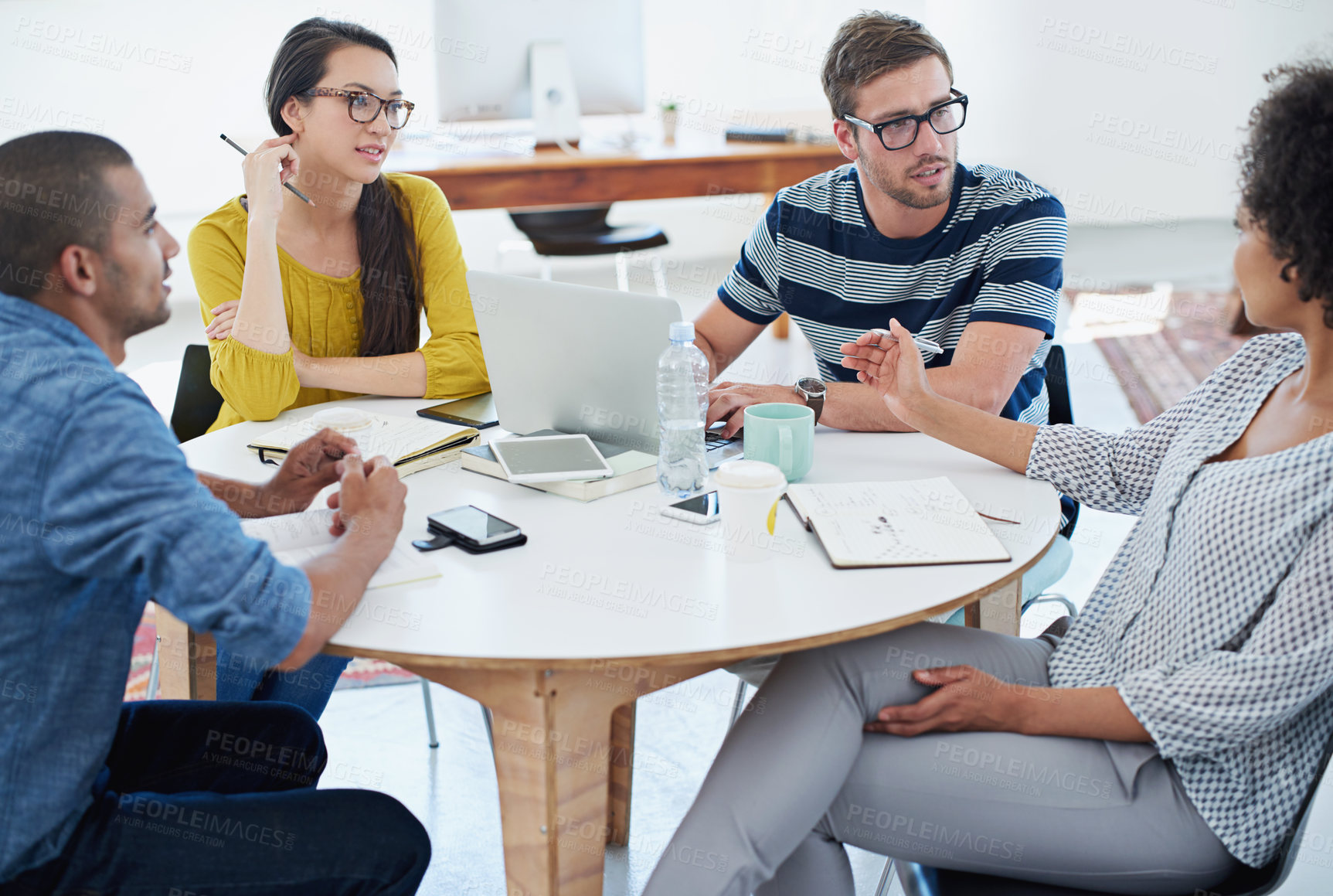 Buy stock photo Shot of a group of designers at work in an office