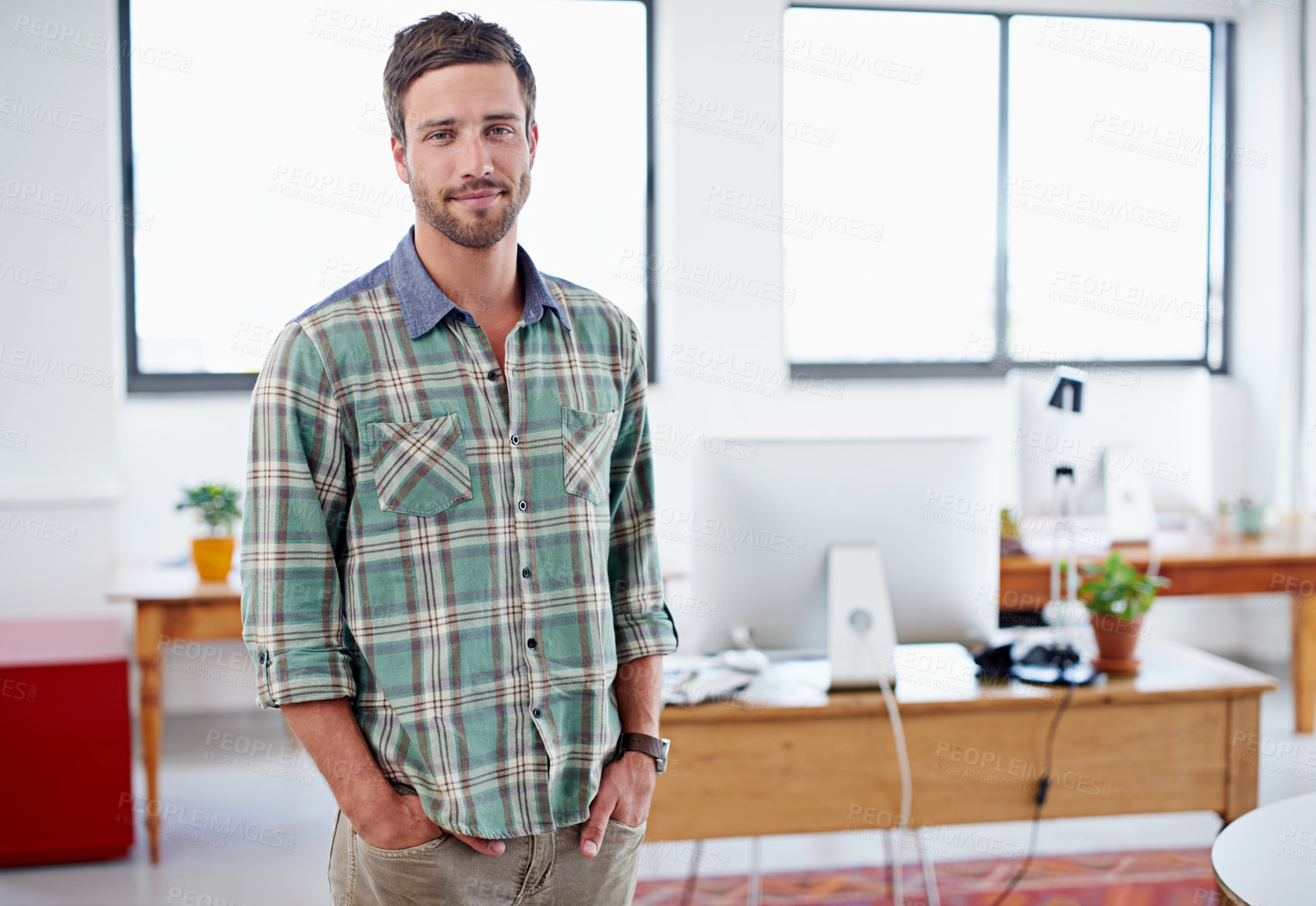 Buy stock photo Portrait of a stylish young man standing in an office