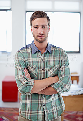 Buy stock photo Portrait of a stylish young man standing in an office
