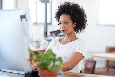 Buy stock photo Beautiful creative professional at work in a bright open plan office space