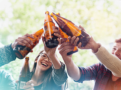 Buy stock photo Friends, beer and toast for celebration outdoor, bonding and fun with people drinking at party, social event or gathering. Happy, cheers for success or achievement, support and trust with alcohol