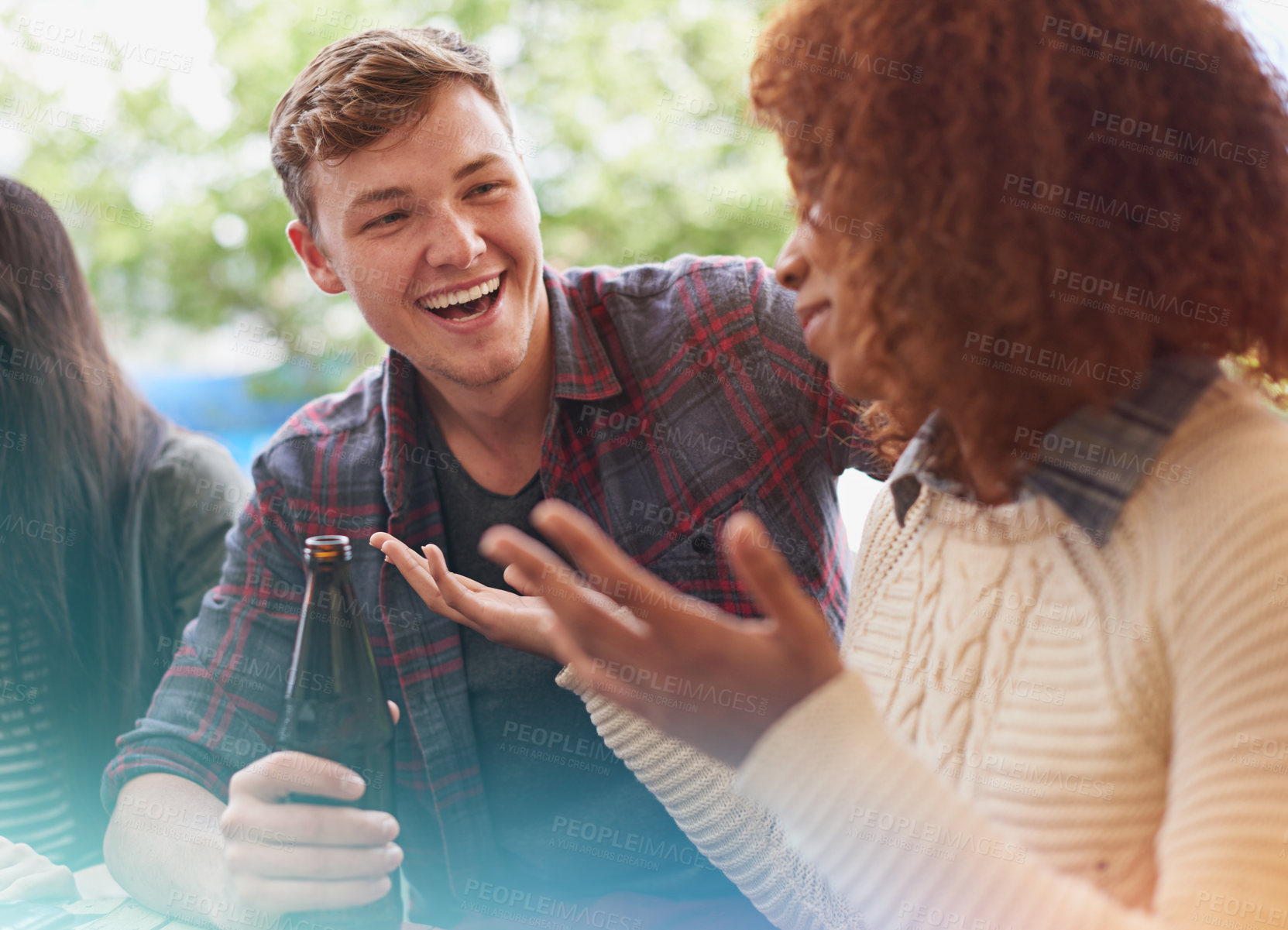 Buy stock photo Cropped shot of a group of friends drinking outdoors