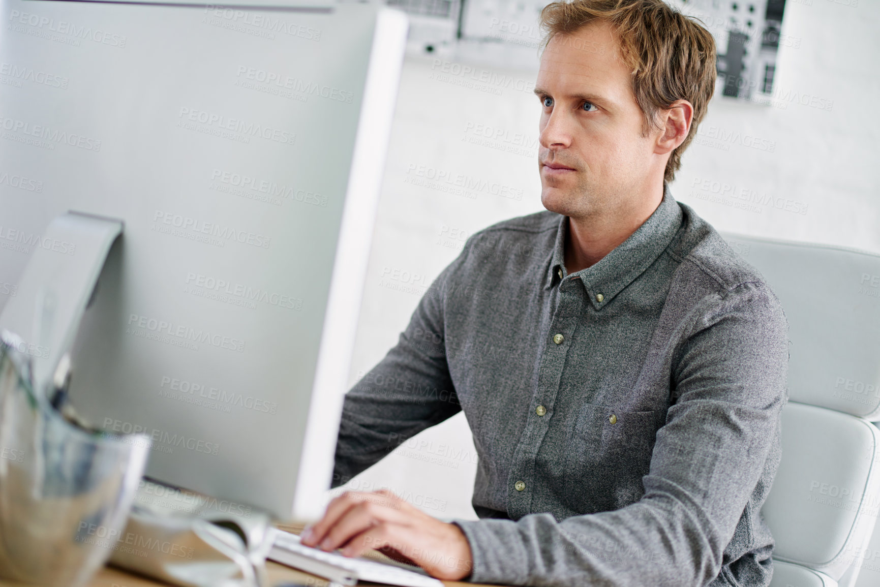 Buy stock photo Cropped shot of a handsome businessman in his office