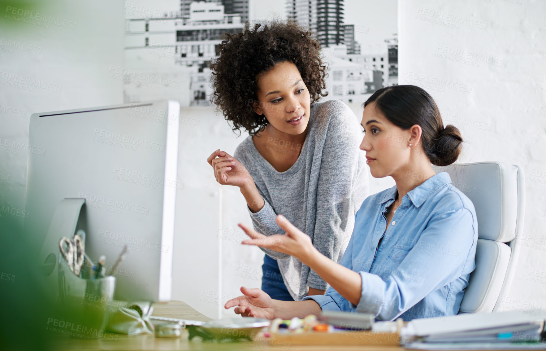 Buy stock photo Business woman, computer and discussion with colleague for project, coaching or teamwork at office. Female person or young employees discussing or explaining tasks on idea together at workplace