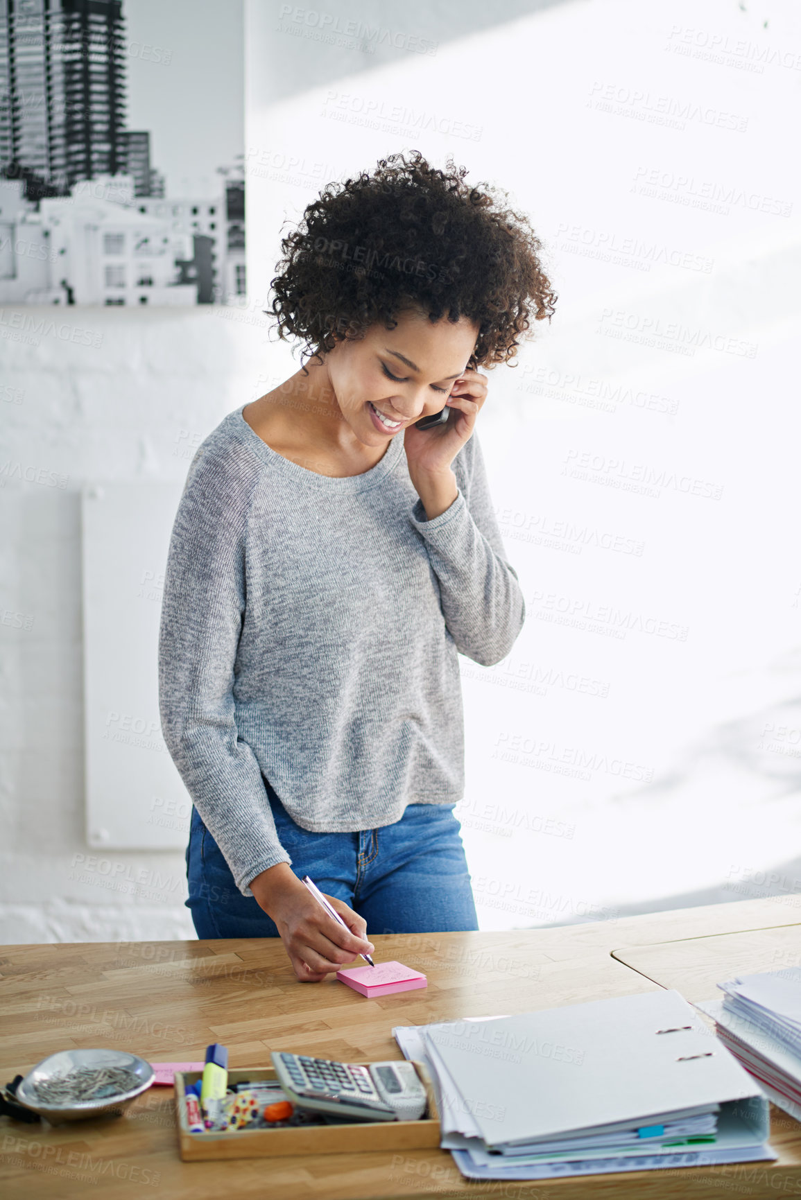 Buy stock photo African businesswoman, phone call and notes with communication in office for networking or conversation. Creative person, designer and smartphone with discussion, talking and consulting in workplace