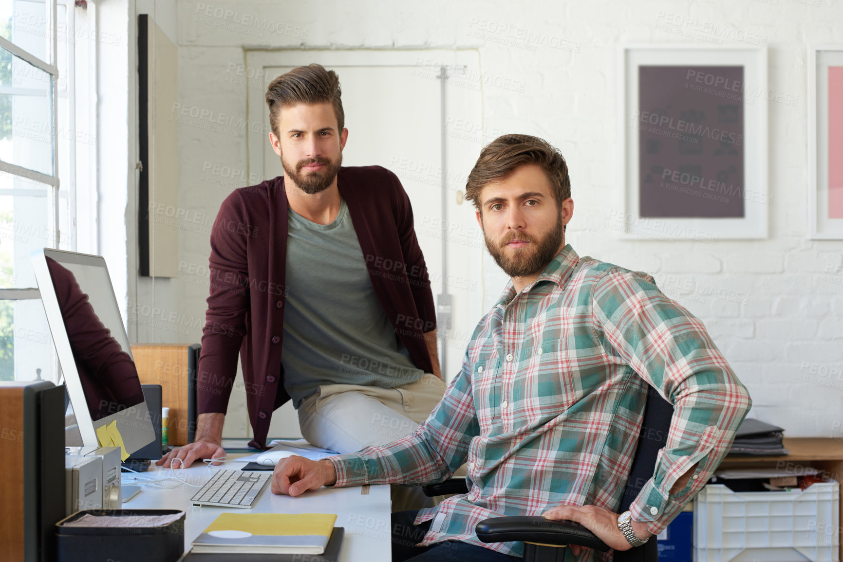 Buy stock photo Portrait of a handsome businessman working in his office