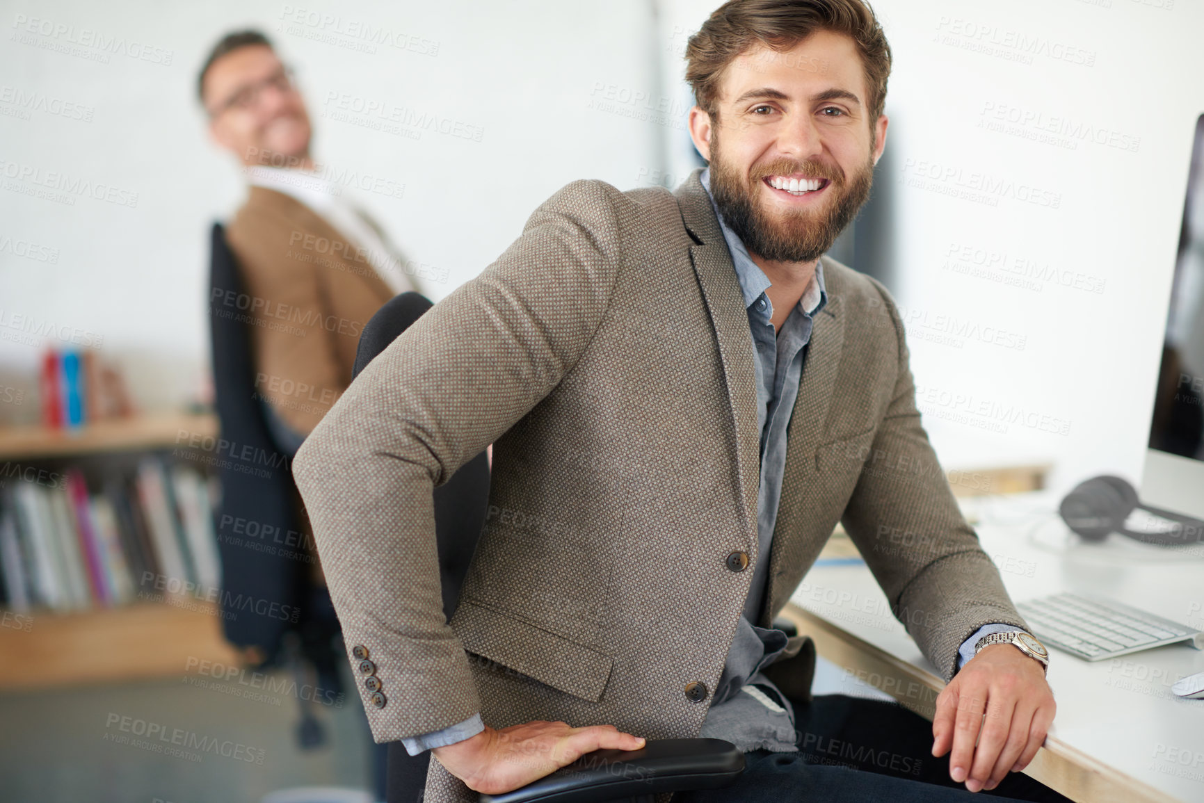 Buy stock photo Employee, man and happy on portrait in office with pride for career, job growth and graphic designer. Workplace, creativity and smile or satisfied with startup company, business and opportunity