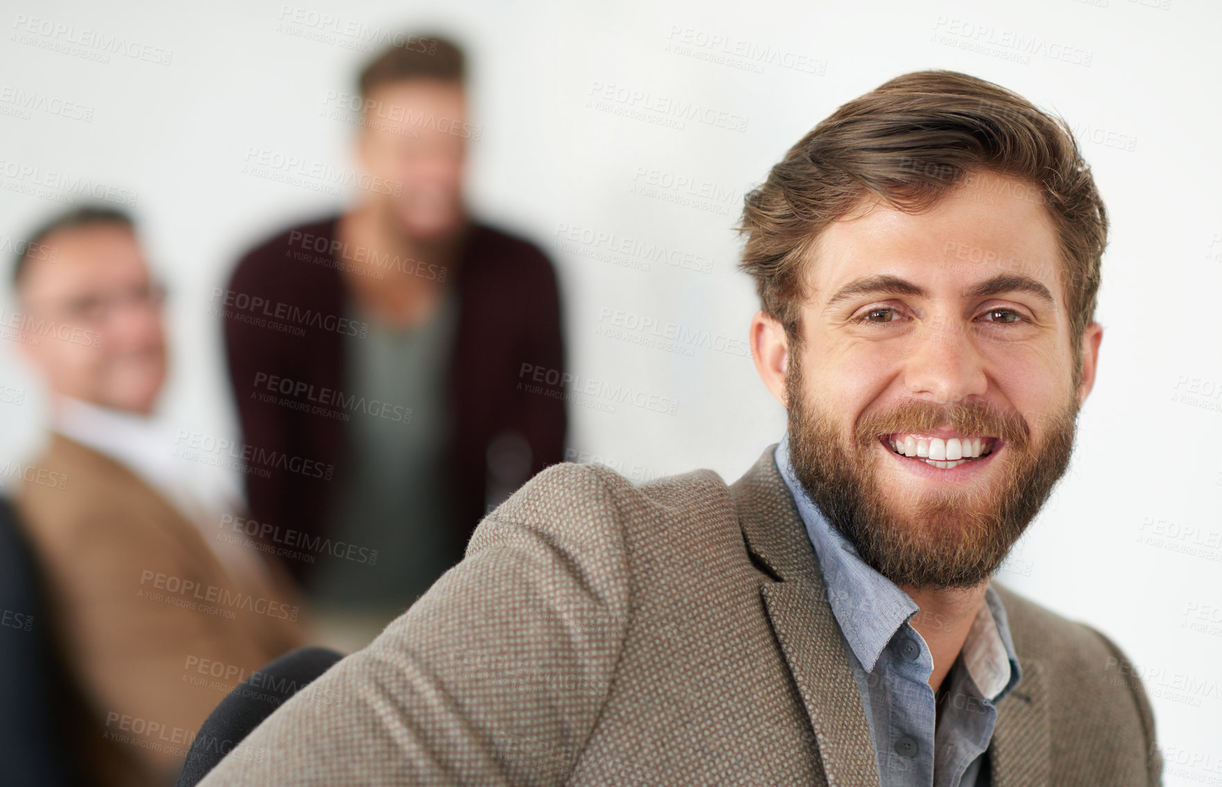 Buy stock photo Portrait of a handsome businessman working in his office