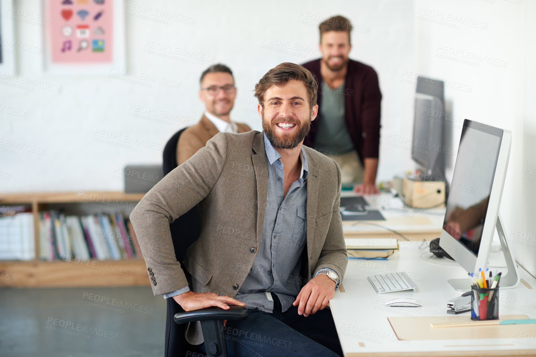 Buy stock photo Portrait of a handsome businessman working in his office