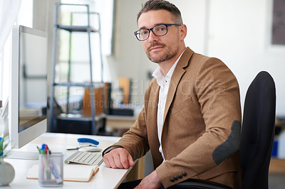 Buy stock photo Businessman, glasses and portrait in office, computer and vision for project, reporter and professional. Face, proud and entrepreneur in company, journalist and confidence in startup and notes