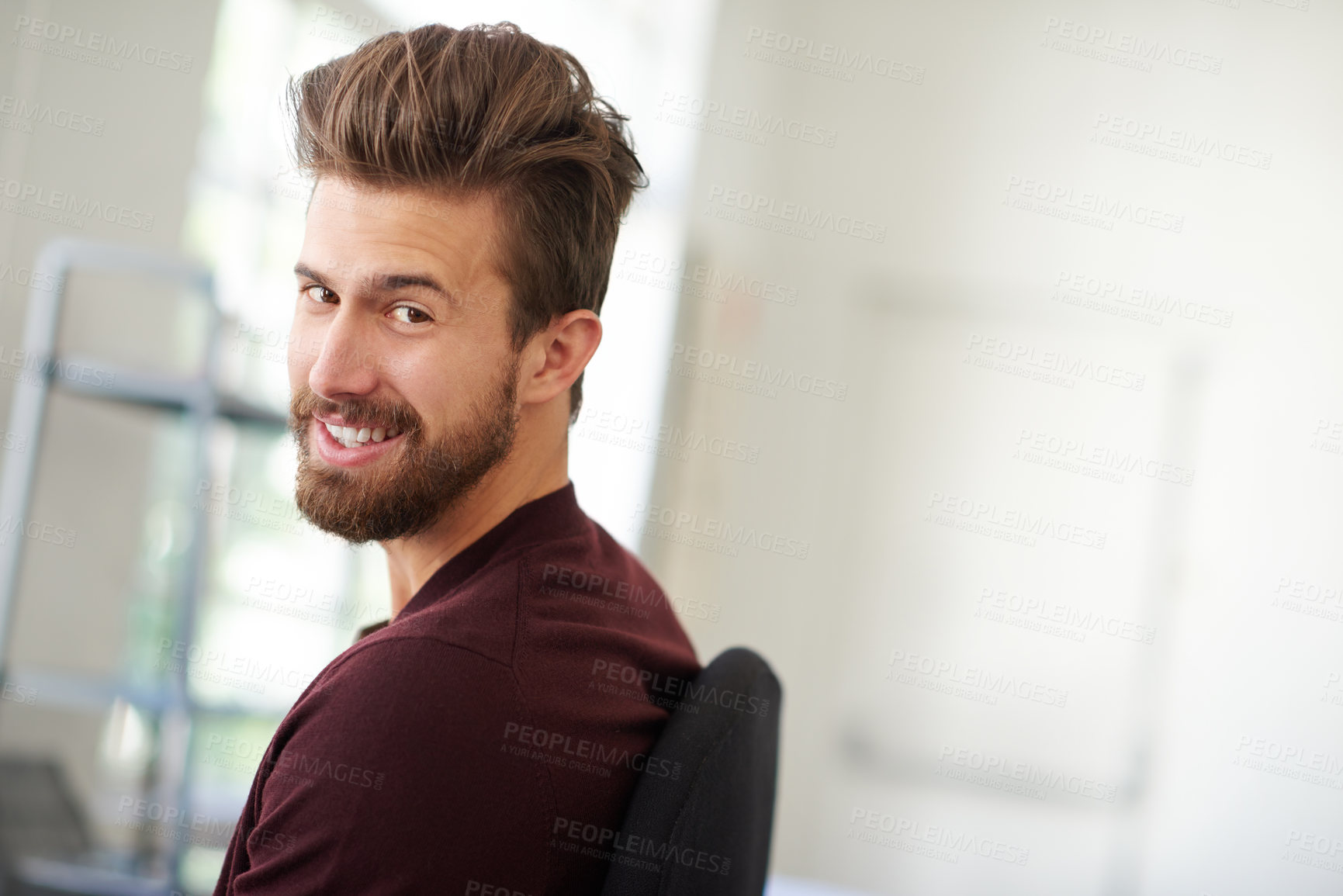 Buy stock photo Portrait of a handsome businessman working in his office