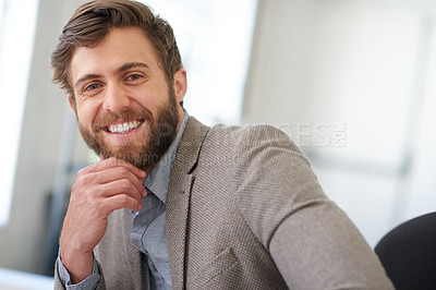 Buy stock photo Portrait of a handsome businessman smiling positively at the camera