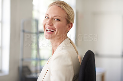 Buy stock photo Beautiful professional woman laughing pleasantly in a bright space