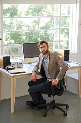 Buy stock photo Portrait of handsome contemporary designer at his desk
