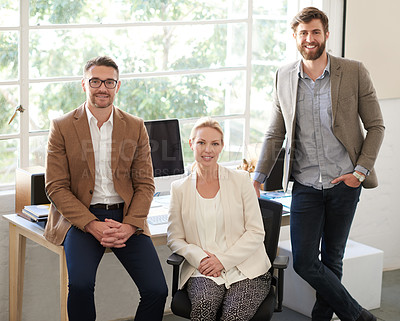 Buy stock photo Colleagues in a creative space looking positively at the camera
