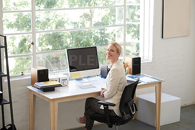 Buy stock photo Portrait of a beautiful businesswoman working in her office