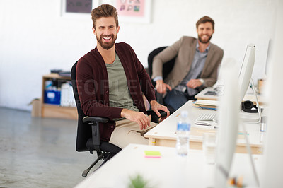 Buy stock photo Businessman, happy and portrait in office, table and coworking of colleagues, computer and together. Face, working and entrepreneur in company, journalist and confidence in startup and creative