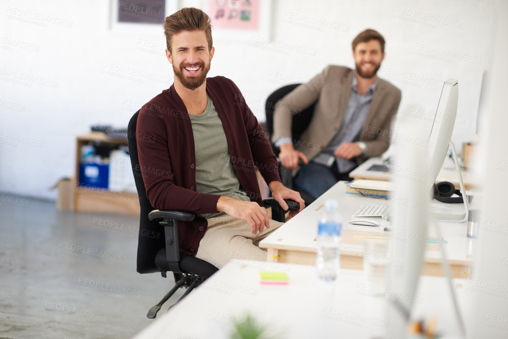 Buy stock photo Businessman, happy and portrait in office, table and coworking of colleagues, computer and together. Face, working and entrepreneur in company, journalist and confidence in startup and creative