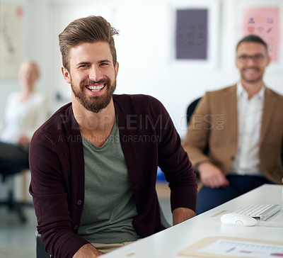 Buy stock photo Smiling creative professional with a colleague in the background
