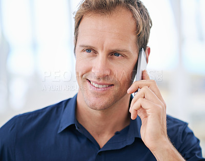 Buy stock photo Listen, happy man or phone call in home talking or speaking in living room for communication or chat. Smile, news and male person with mobile in conversation to relax in apartment or house on break
