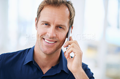 Buy stock photo Portrait, happy man or phone call in house talking or speaking in living room for communication or chat. Smile, news and male person with mobile in conversation to relax in apartment or home on break