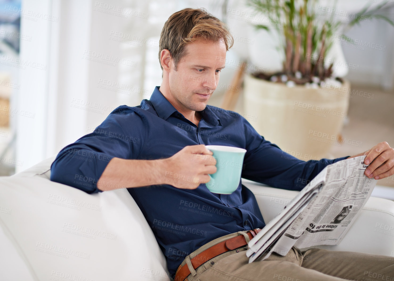 Buy stock photo Reading, newspaper and man in home with coffee in morning to relax with news and announcement. Calm, businessman and report on international politics in media and info on paper with espresso or tea