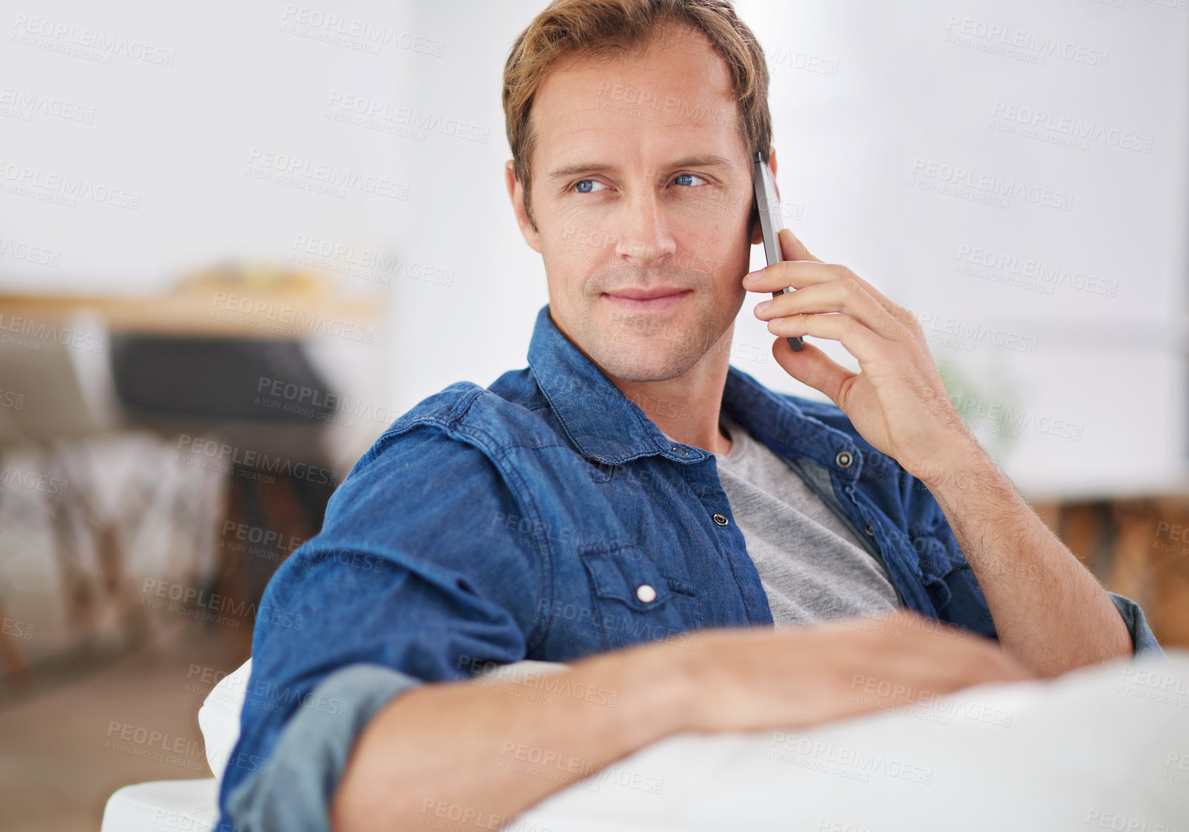 Buy stock photo Thinking, man and phone call to relax in house for talking, speaking and communication on sofa. Ideas, news and confident male person on mobile chat in conversation and discussion in home for break