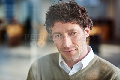 Buy stock photo Cropped shot of a casually-dressed businessman standing in his office