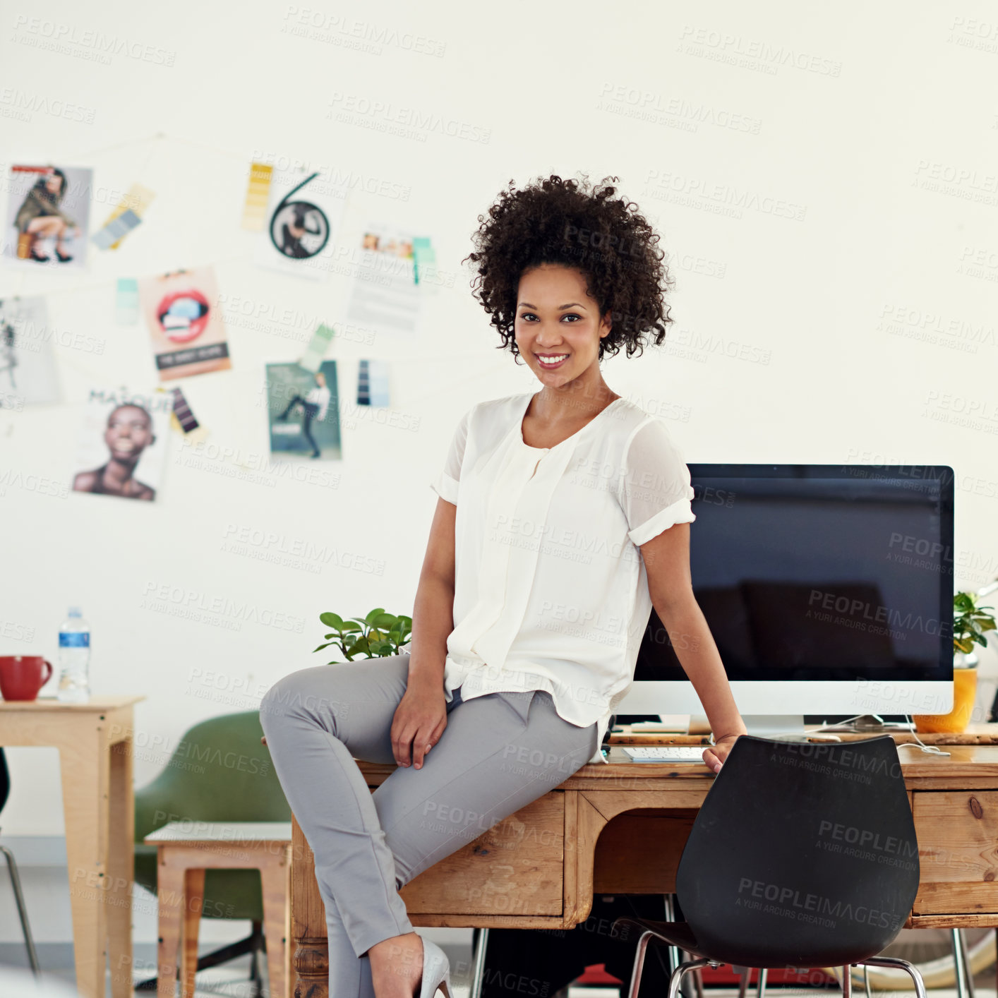 Buy stock photo Cropped shot of an attractive young woman in her office