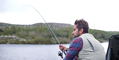 Buy stock photo Fishing, lake and man with vacation, relax and hobby with environment, water and weekend break. Outdoor activity, peaceful and holiday with getaway trip or countryside with woods or travel with grass
