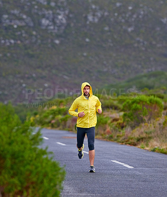 Buy stock photo Running, winter and man with fitness, exercise and endurance with progress and morning cardio. Wet, runner and athlete with fitness and training with wind and nature with challenge, cold and wellness