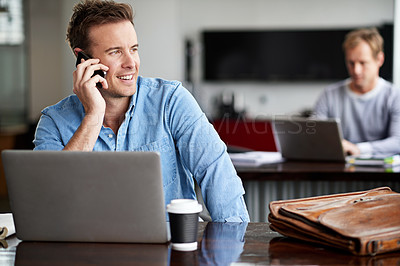 Buy stock photo Laptop, phone call and conversation in office for businessman, talking and cellphone in workplace. Technology, smartphone and communication on mobile for male person, creative writer and journalist