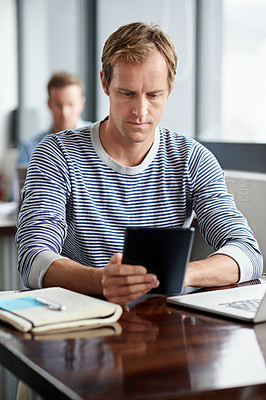 Buy stock photo Male journalist, notebook and tablet in office for news, updates and communication or articles. Man, online and journal at table for research, story or report on recent events, information or details