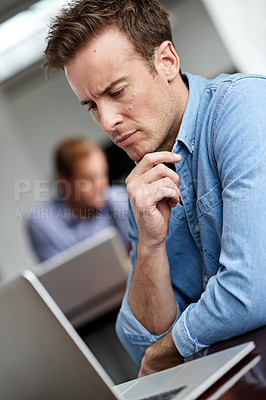Buy stock photo Businessman, laptop and thinking with decision for choice, research or browsing at office. Young man or employee in wonder or thought on computer for solution, results or problem solving at workplace