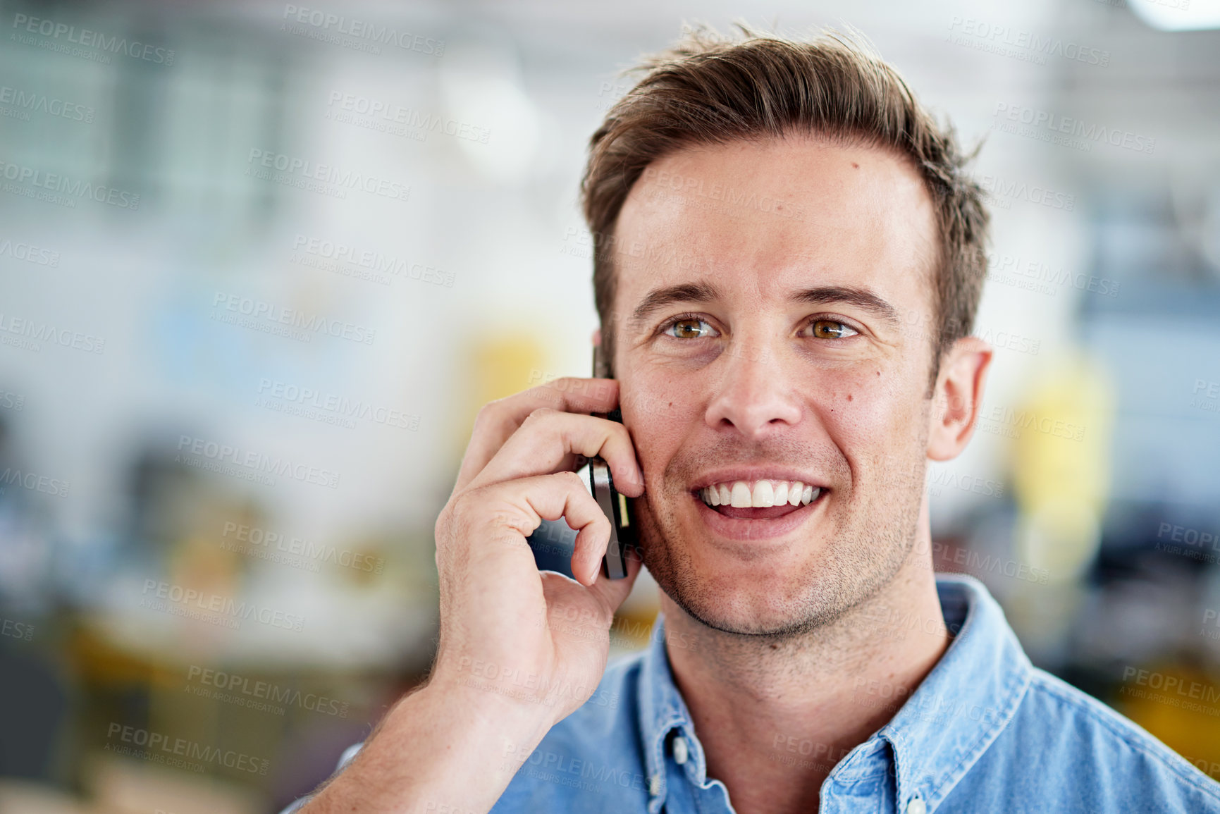 Buy stock photo Man, employee and happy in office with phone call for communication or networking as website designer. Business, smile and confident with conversation for project in digital agency and proud