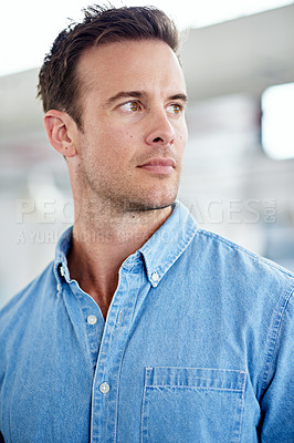 Buy stock photo Shot of smiling man in a casual work environment