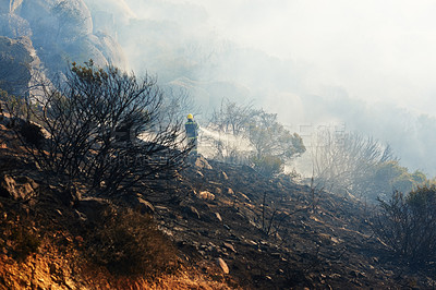 Buy stock photo Wild fire, firefighter and environment with emergency, burning and nature with smoke, forest and chaos. Outdoor, person or woods with trees, landscape or flames with natural disaster, plants or risk