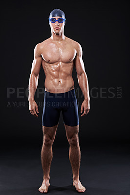 Buy stock photo Full length studio portrait of a young male swimmer