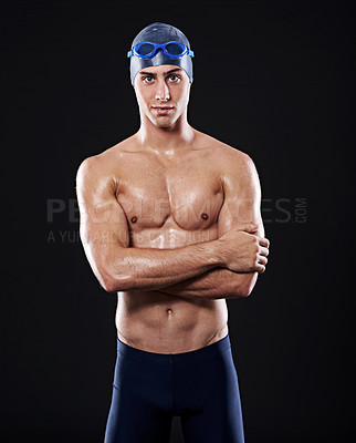 Buy stock photo Studio portrait of a young male swimmer