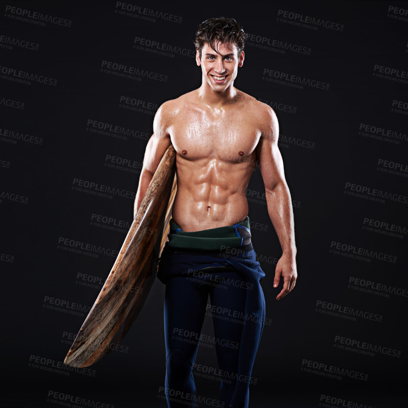 Buy stock photo Studio, surfboard and portrait of male surfer, smile or  athlete isolated on black background. Body, swimsuit or wetsuit for water sports for man model person, equipment or board for fitness or hobby