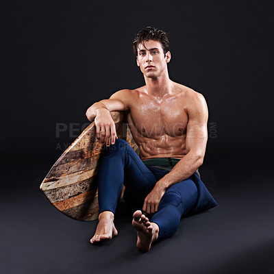 Buy stock photo Studio, portrait of surfer and surfboard for sports, fitness and training for competition event. Professional athlete or model and man with mockup, activity or hobby on dark background with pride