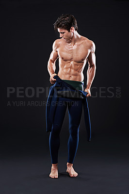 Buy stock photo Swimmer, athlete and man in studio, body and muscle from fitness, training and exercise for wellness. Dark background, champion and male person, performance and pride for sports, workout and health