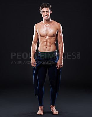 Buy stock photo Studio background, portrait of surfer or smile for sports, fitness and training for competition event. Professional athlete, male person or model and man with body, muscle or abs with pride