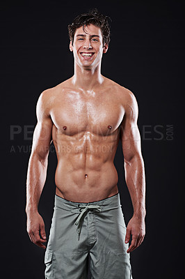 Buy stock photo Happy man, fitness and portrait in studio with body, exercise and training on dark background. Pride, professional athlete and Irish male swimmer with abs for health, wellness and workout by backdrop